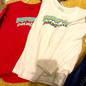 Two long sleeve Patagonia shirts. Girls size 7/8.